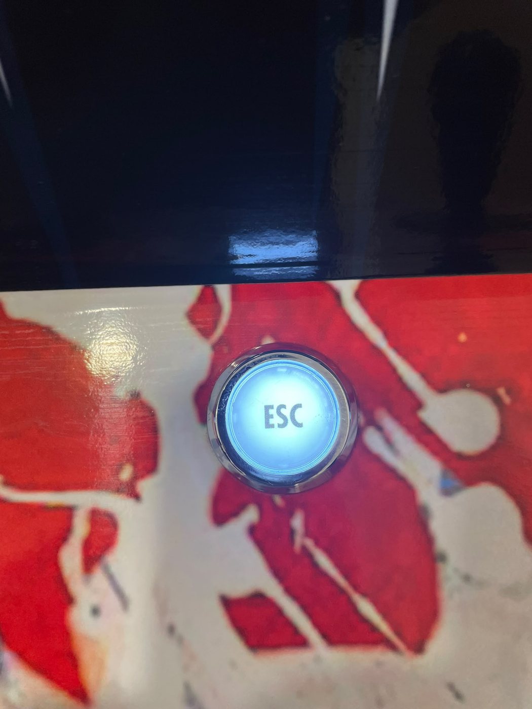 Botão ESC da máquina arcade
