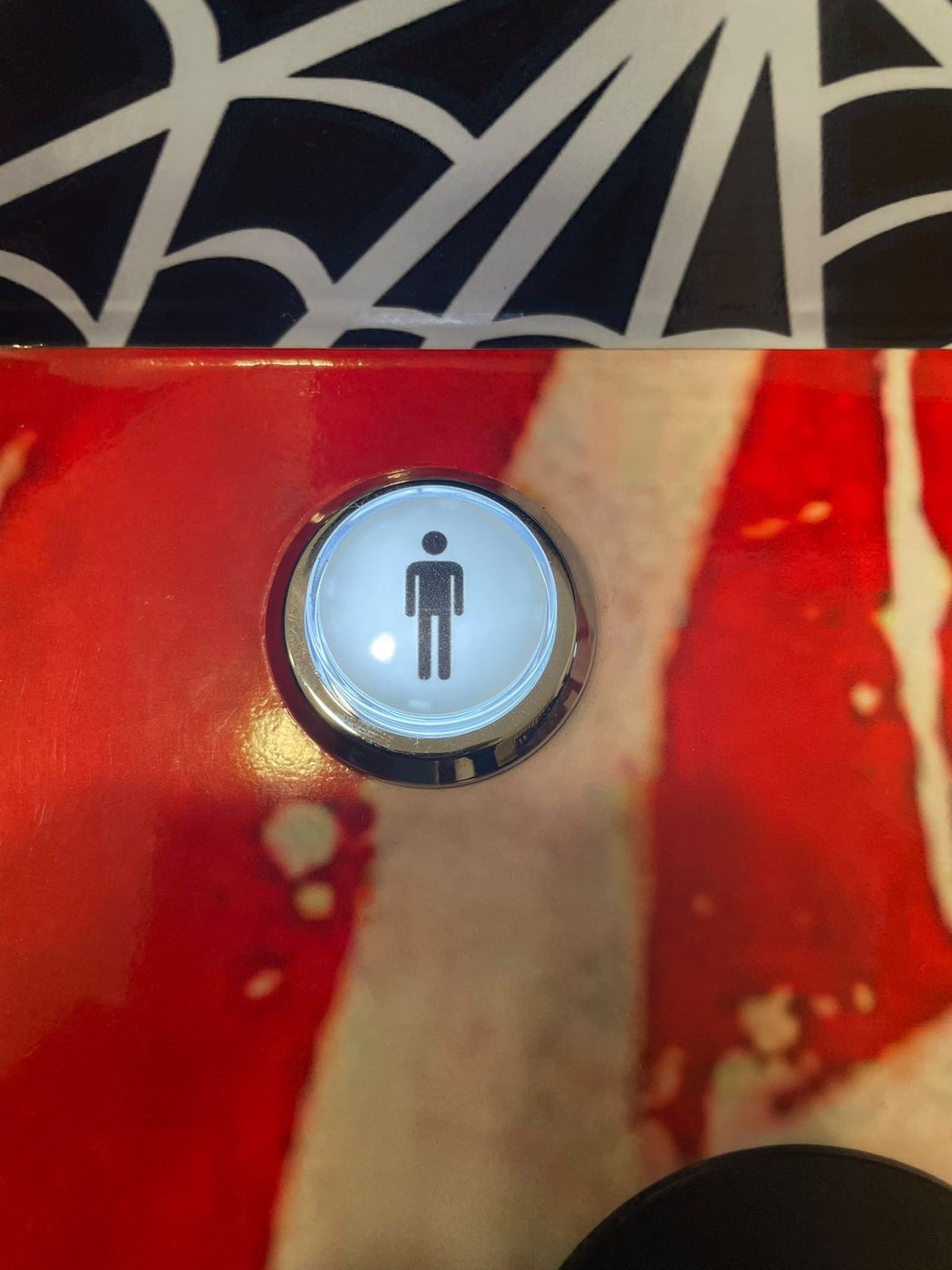 Botão de um jogador na máquina arcade